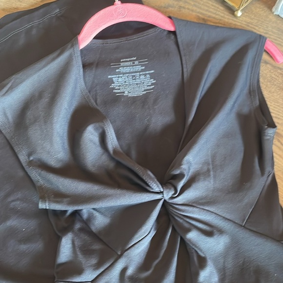 Patagonia Twist Front Dress 
XS 
36” Total Length 
Stretchy, wicking fabric - Picture 4 of 5